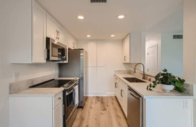 Recently Renovated!! - 3 Bedroom/2 Bath First floor corner unit with 2 car garage and A/C!!!  photos photos