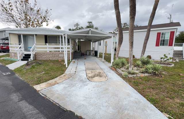 Beautiful 2 bedroom 2 bath mobile home for rent in 55+ community in south Tampa photos photos