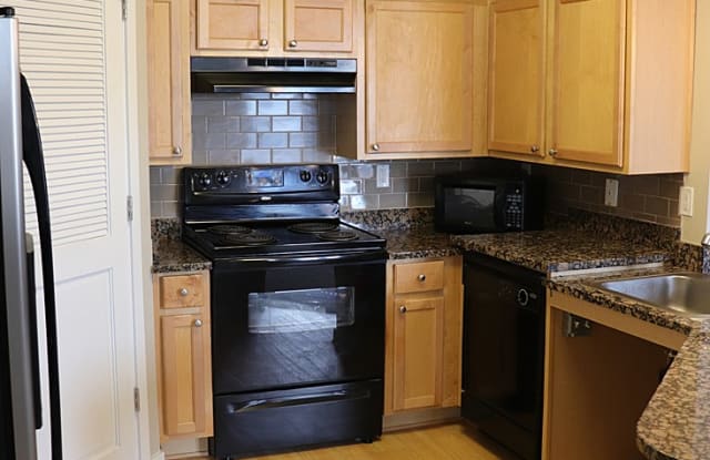 6301 E Hampden Ave - 6301 Hampden Avenue, Denver, CO 80222