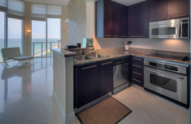 6515 Collins Ave photos photos