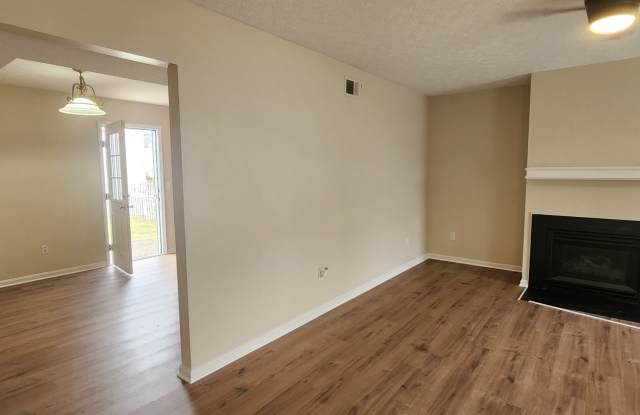 Fantastic 3 Bedrooms & 1.5 Bathroom, Two Story with a Garage!  Freshened Paint throughout!  Newer Pergo Flooring throughout! Nice Backyard and a Fireplace! Gallery 3