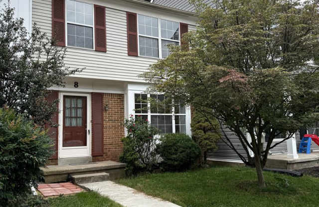 Spacious 3-Bedroom Townhome in Wellington Valley | Finished Basement & Wooded Views Gallery 1