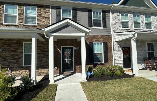 FOR LEASE- Townhome Nestled on a quiet dead-end road, perfect for those seeking privacy and peaceful surroundings. Gallery 1