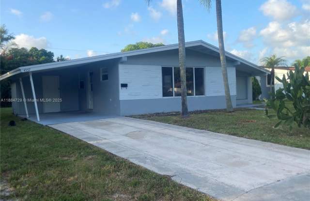 4557 NW 3rd St photos photos