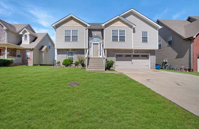 Spacious 4 Bedroom, 3 Bathroom Home with Finished Basement Near Fort Campbell! photos photos