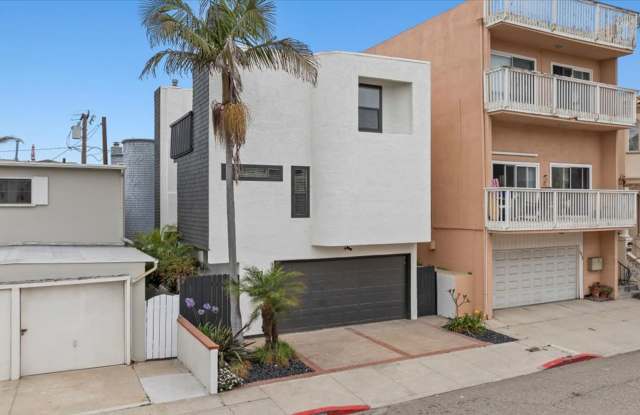 COMPLETELY REMODELED, BRIGHT  AIRY, TRI-LEVEL HOME W/ TOP-FLOOR GREAT ROOM LIVING SPACE, 2-CAR GARAGE, DECK  SPACIOUS PATIO/YARD JUST 2 BLOCKS TO BEACH! photos photos