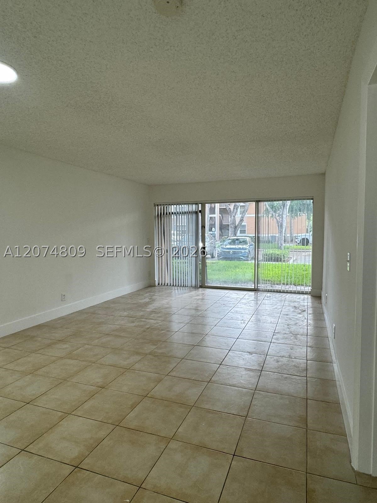 8801 Wiles Rd – photo 1