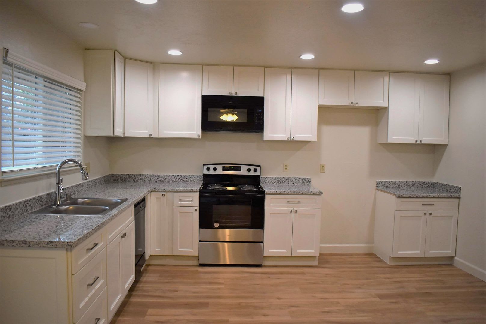 4-bedroom home with luxury vinyl flooring and much more! – photo 1