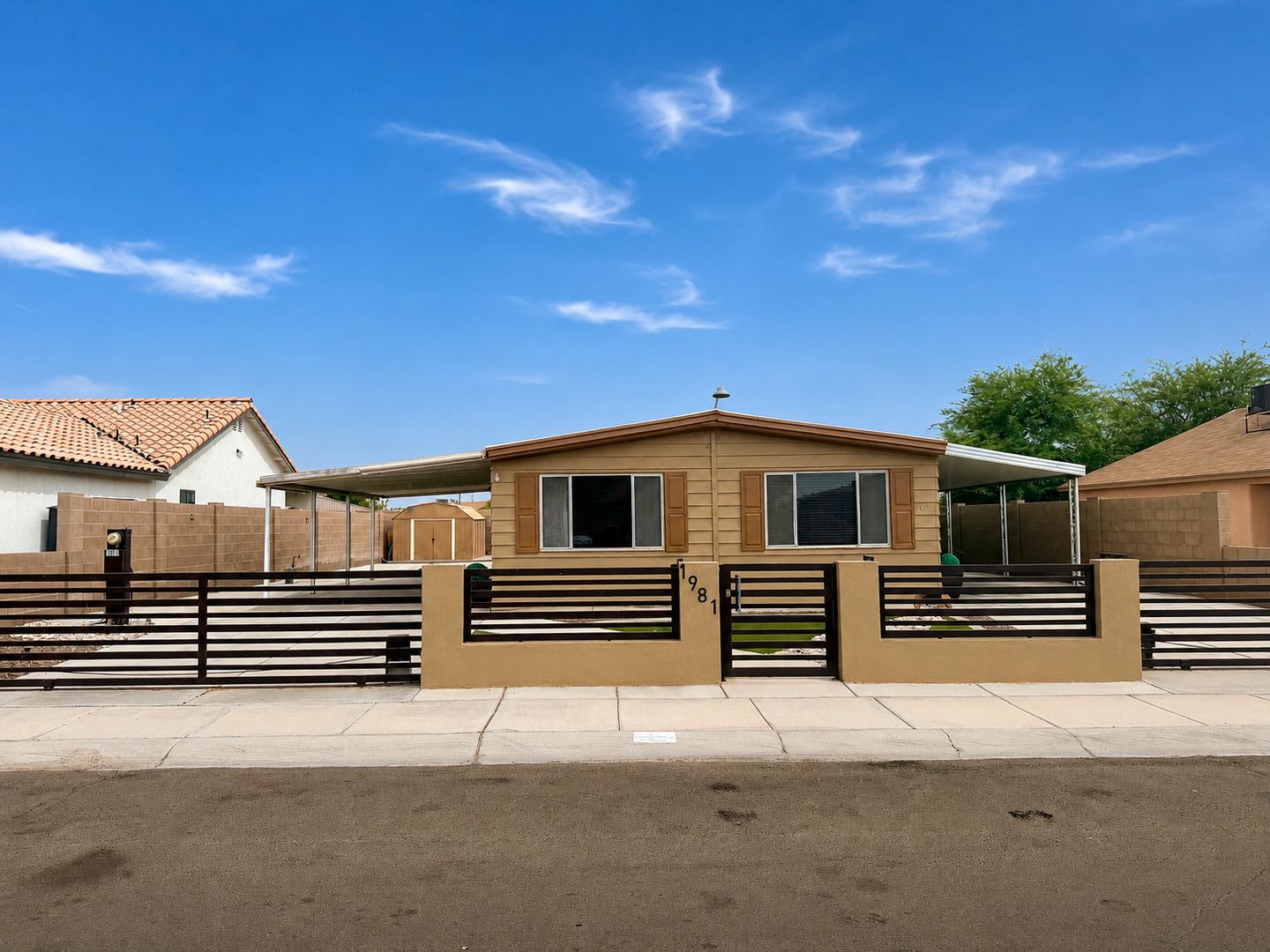 Fully Fenced 3 Bedroom Home With Covered Parking And Landscaped Property – photo 1 of 30