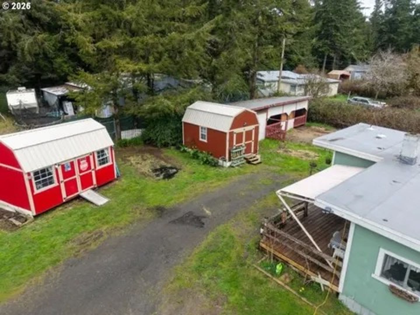 Charming 3-Bedroom Home with Workshop Space &amp; Storage in Houser (North Bend)! – photo 1 of 13