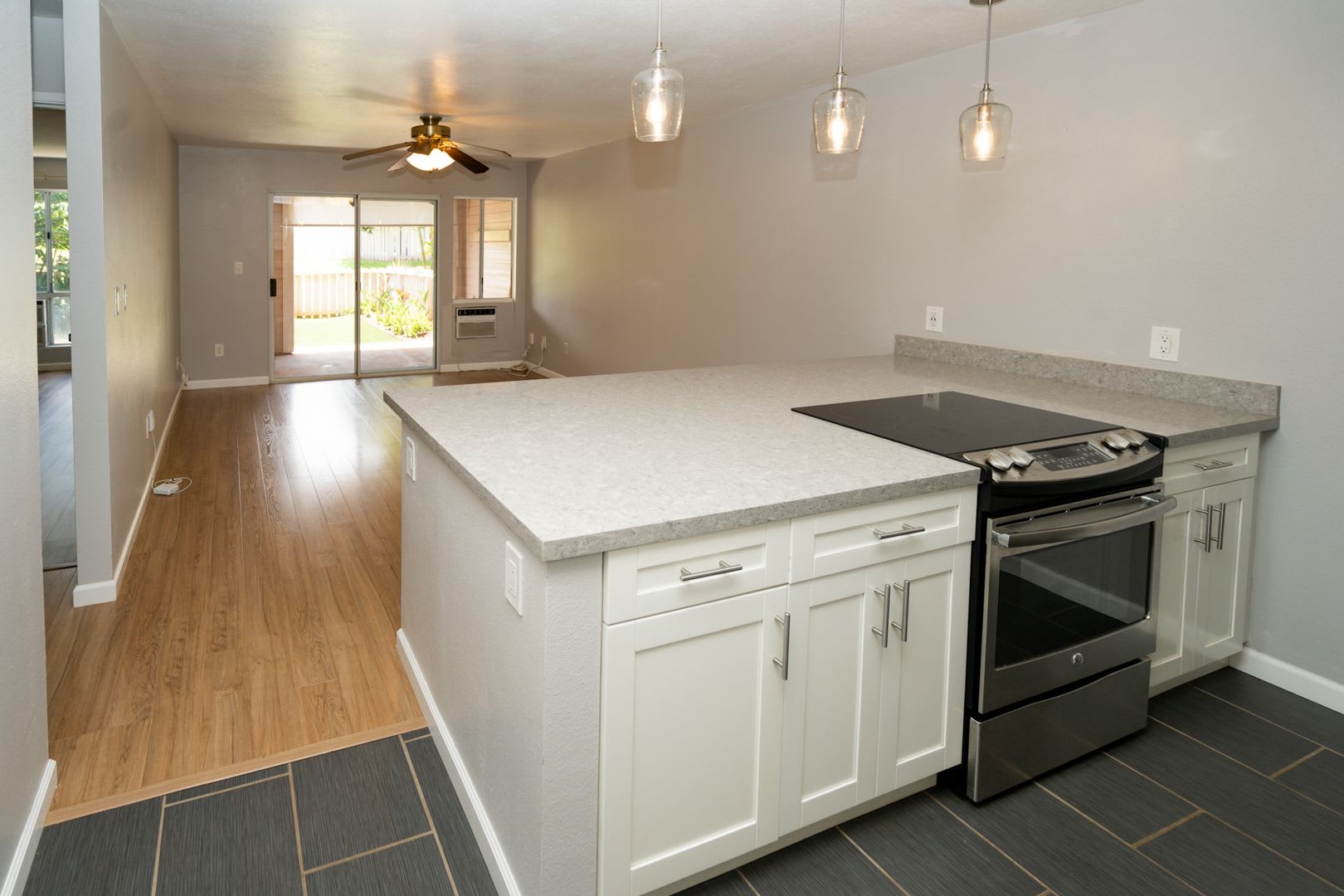 2-Bedroom, 2-Bathroom Home in Waipahu – 2 Parking Stalls &amp; Private Backyard – photo 1 of 17