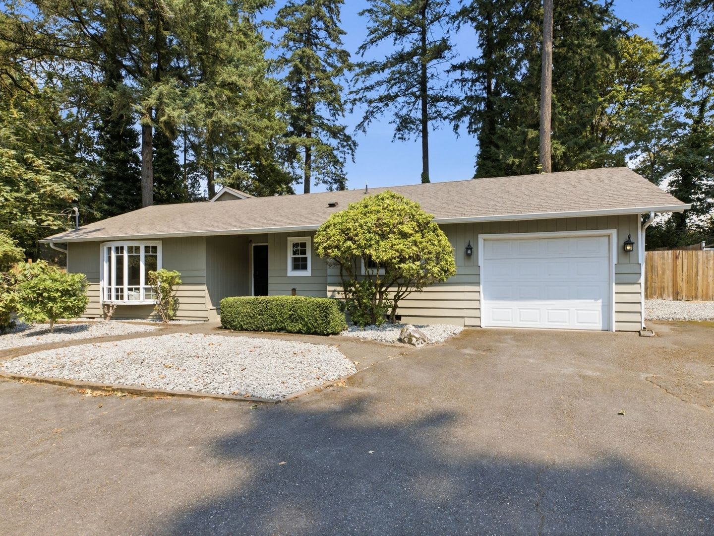 Charming 4-Bedroom Edgewood Home with Large Fenced Yard, Fireplace &amp; Garage! – photo 1 of 34