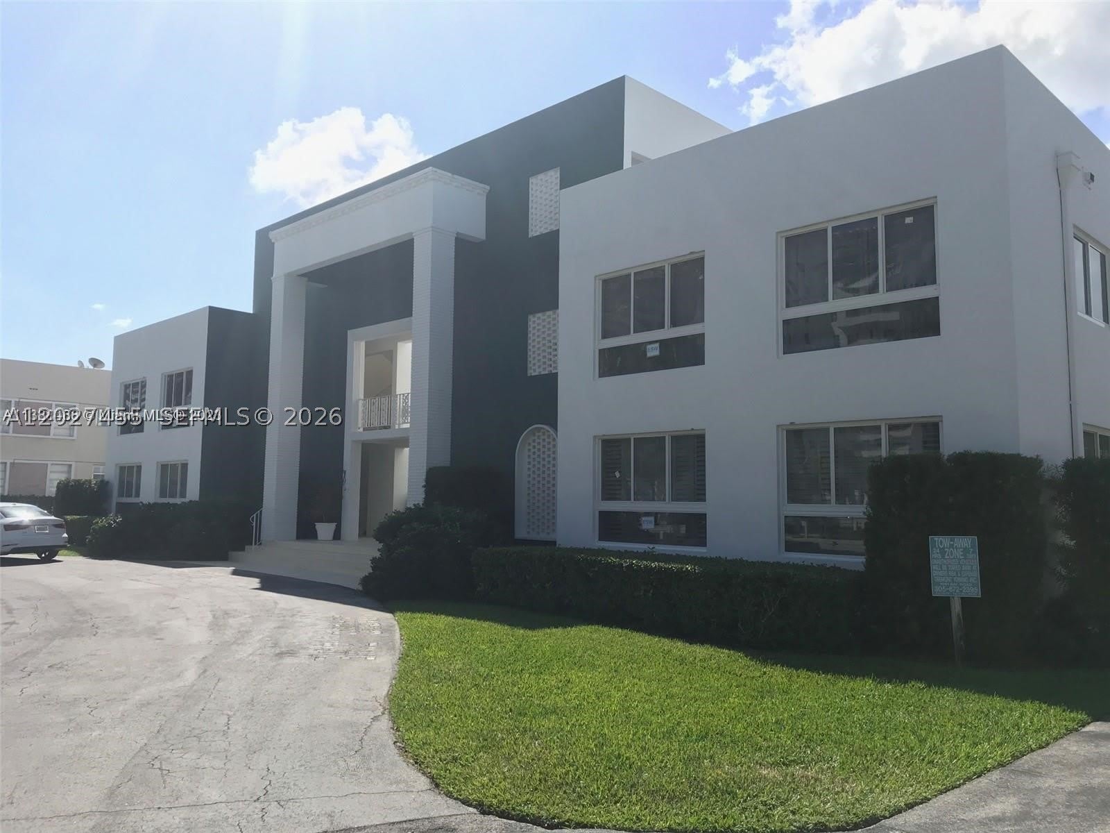 9920 Collins Ave – photo 1 of 14