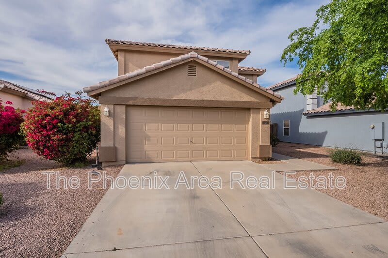 11928 W Columbine Dr – photo 1 of 45