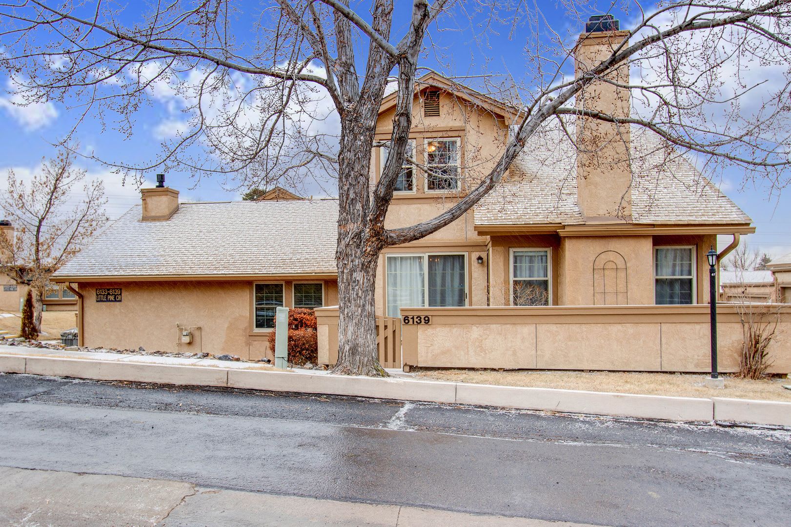 Impeccably Maintained End Unit Townhome With 2 Car Garage Effortless Comfort Convenience Await – photo 1