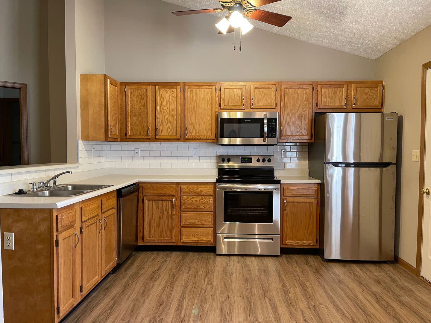 Wake up to a stunning pond view in this beautiful 2 BD 2BA duplex with a 2 car attached garage – photo 1 of 8