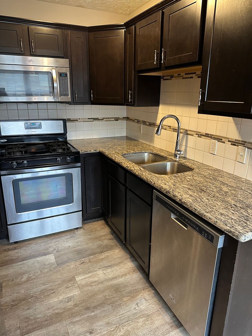 Updated 3 Bed 1.5 Bath Townhome with basement. – photo 1 of 11