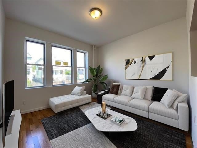84 W 25TH ST – photo 1 of 19