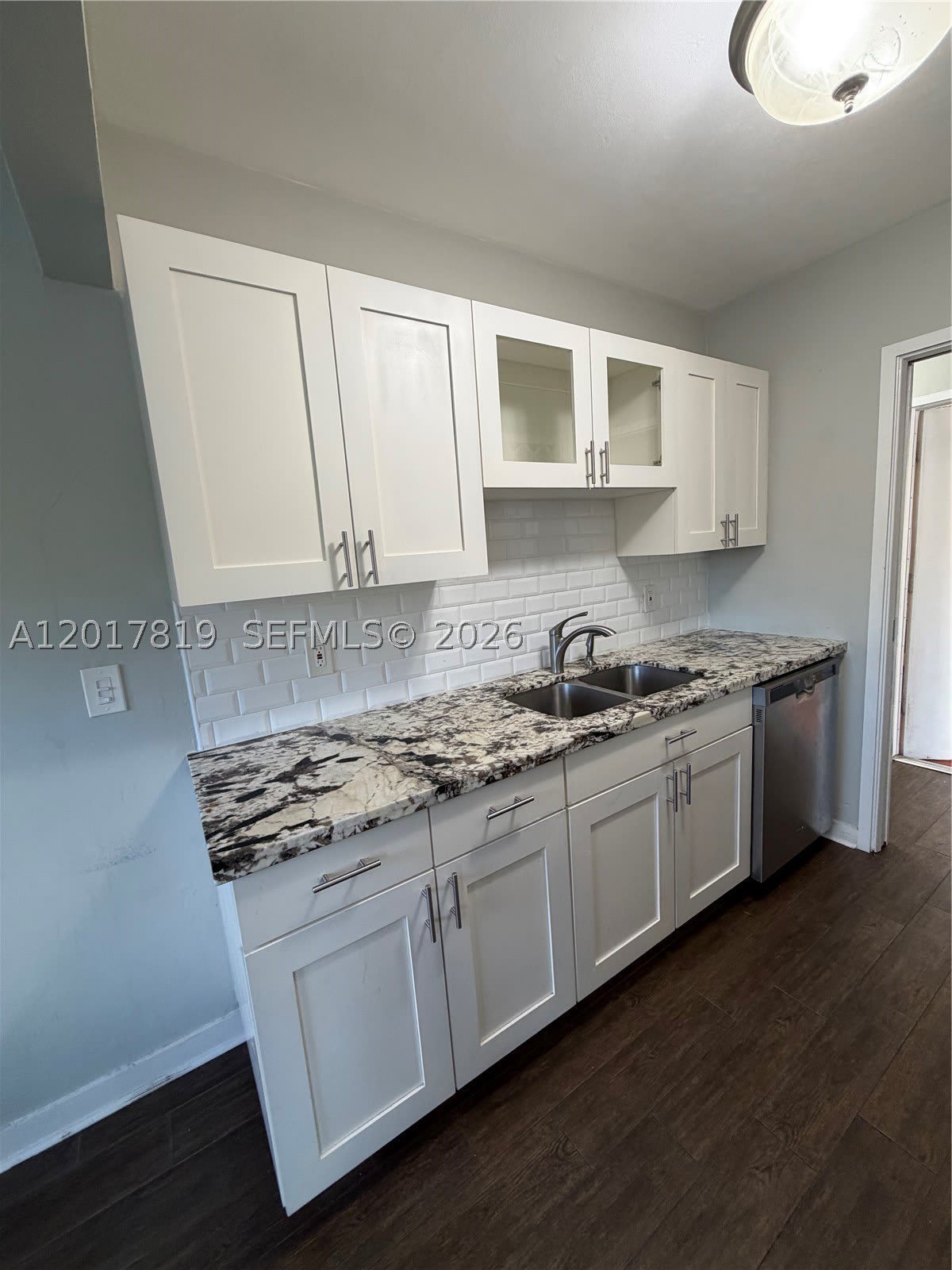 2591 NE 55TH CT – photo 1