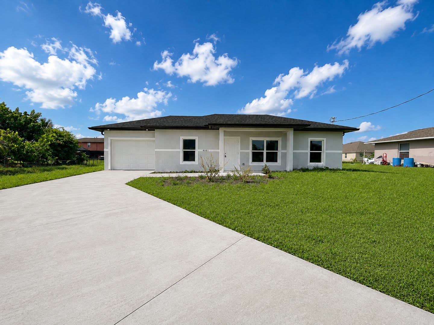 BRAND NEW MODERN SF HOME 3BD+den/2BA with GARAGE IN LEHIGH ACRES! – photo 1