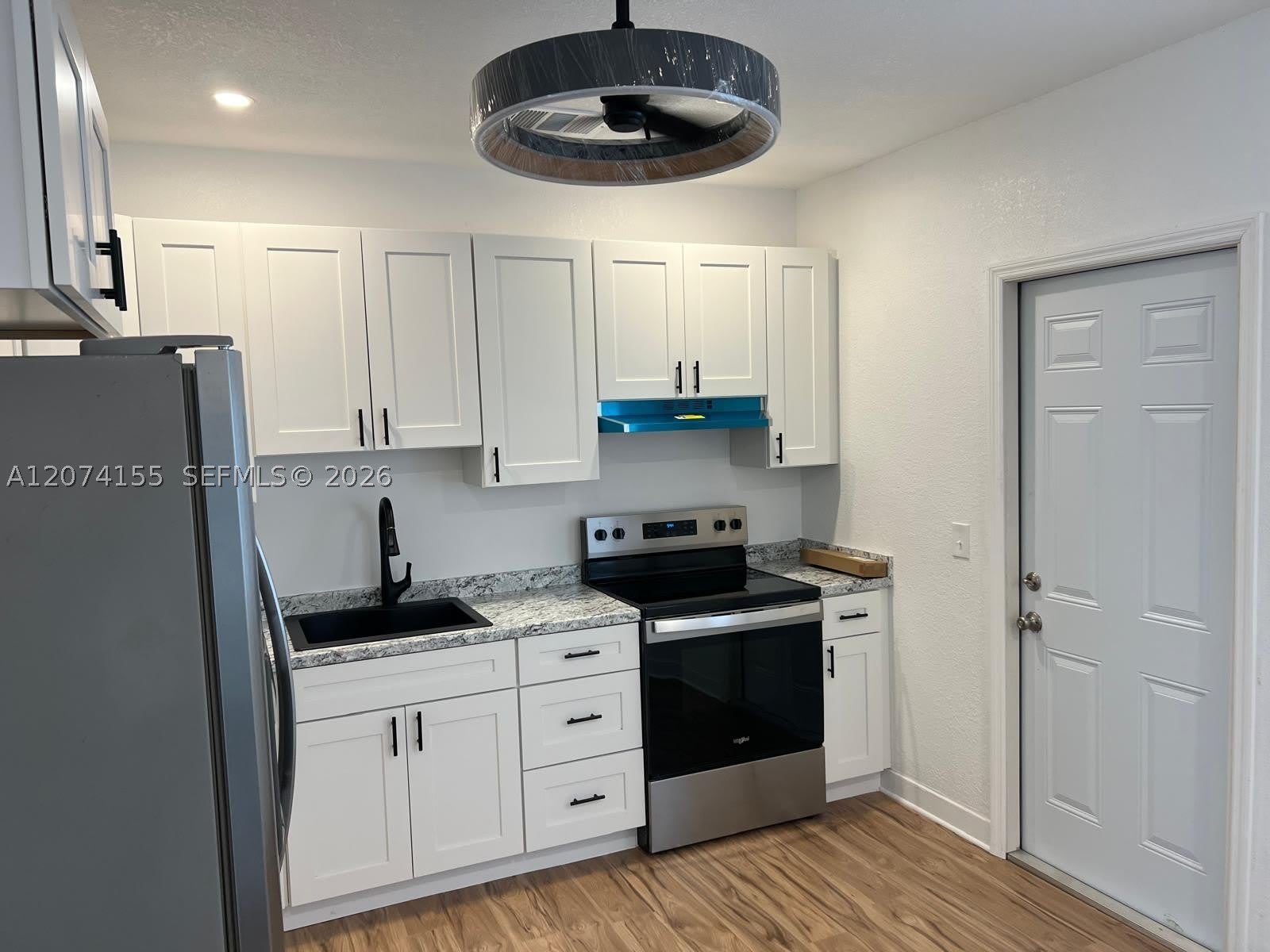 6117 SW 18th St – photo 1