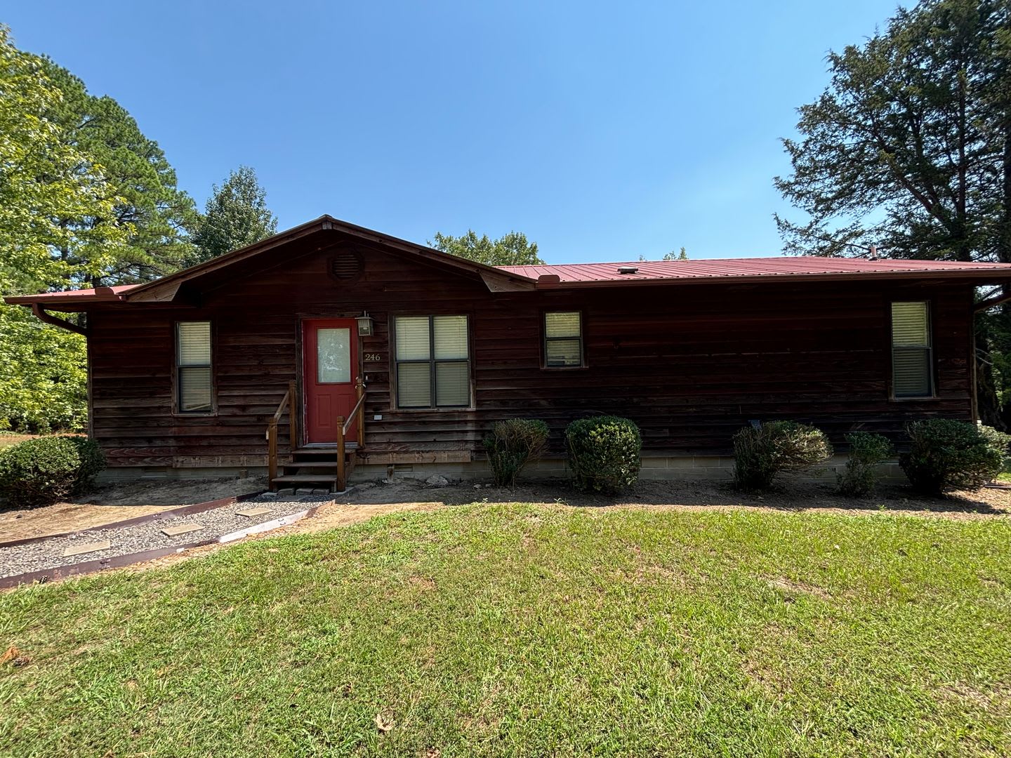 Located on the outskirts of Russellville, this three-bedroom, two-bath home – photo 1 of 13