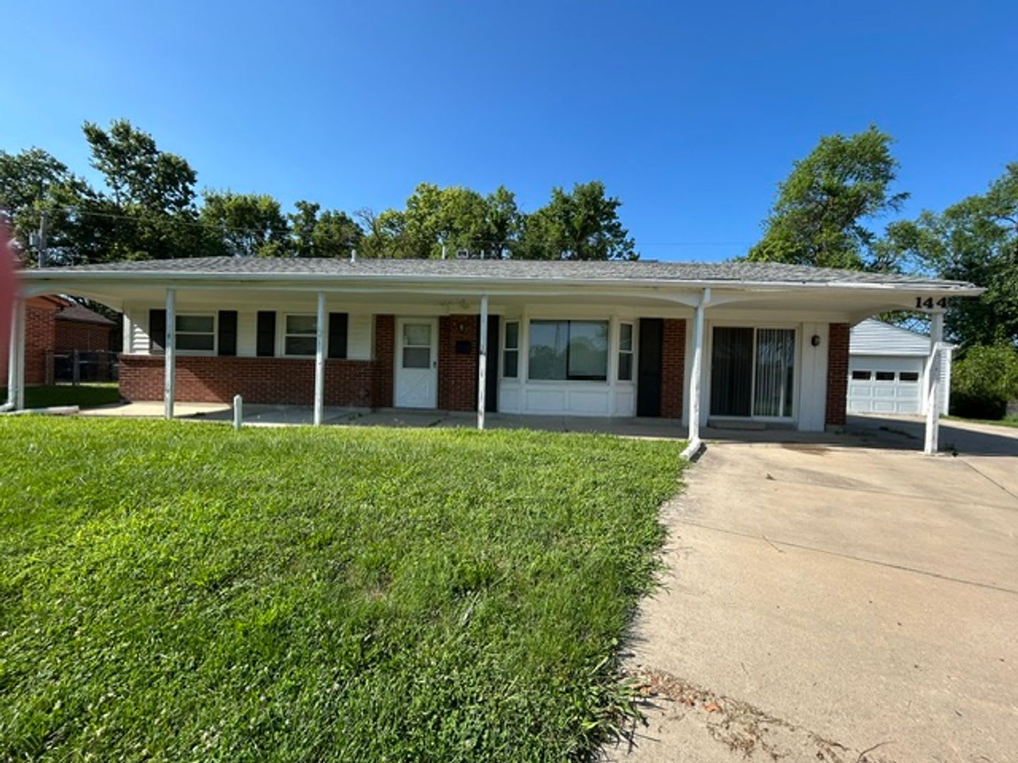 Must See! Large 3 Bedroom, 2 Bath Ranch Home in Englewood w/Large Detached Garage – photo 1 of 26