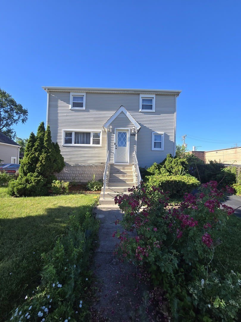 7139 W 74th Place – photo 1 of 31