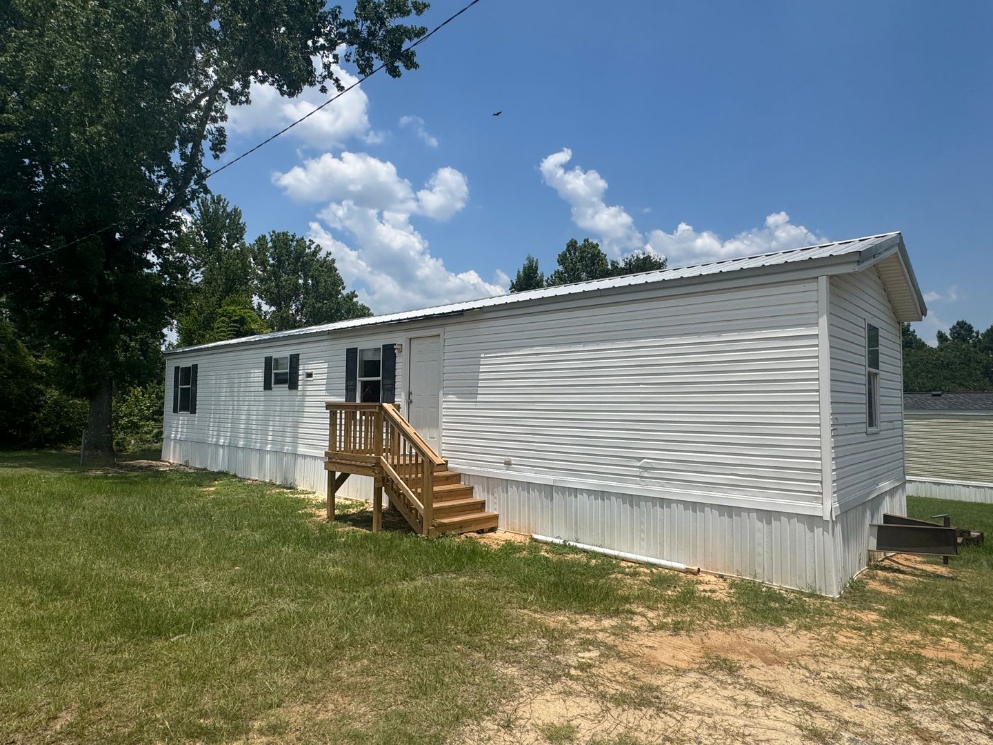 Charming 3/1 Mobile Home in Quiet Park w/ Well, Septic, &amp; Lawn Maintenance – photo 1 of 8