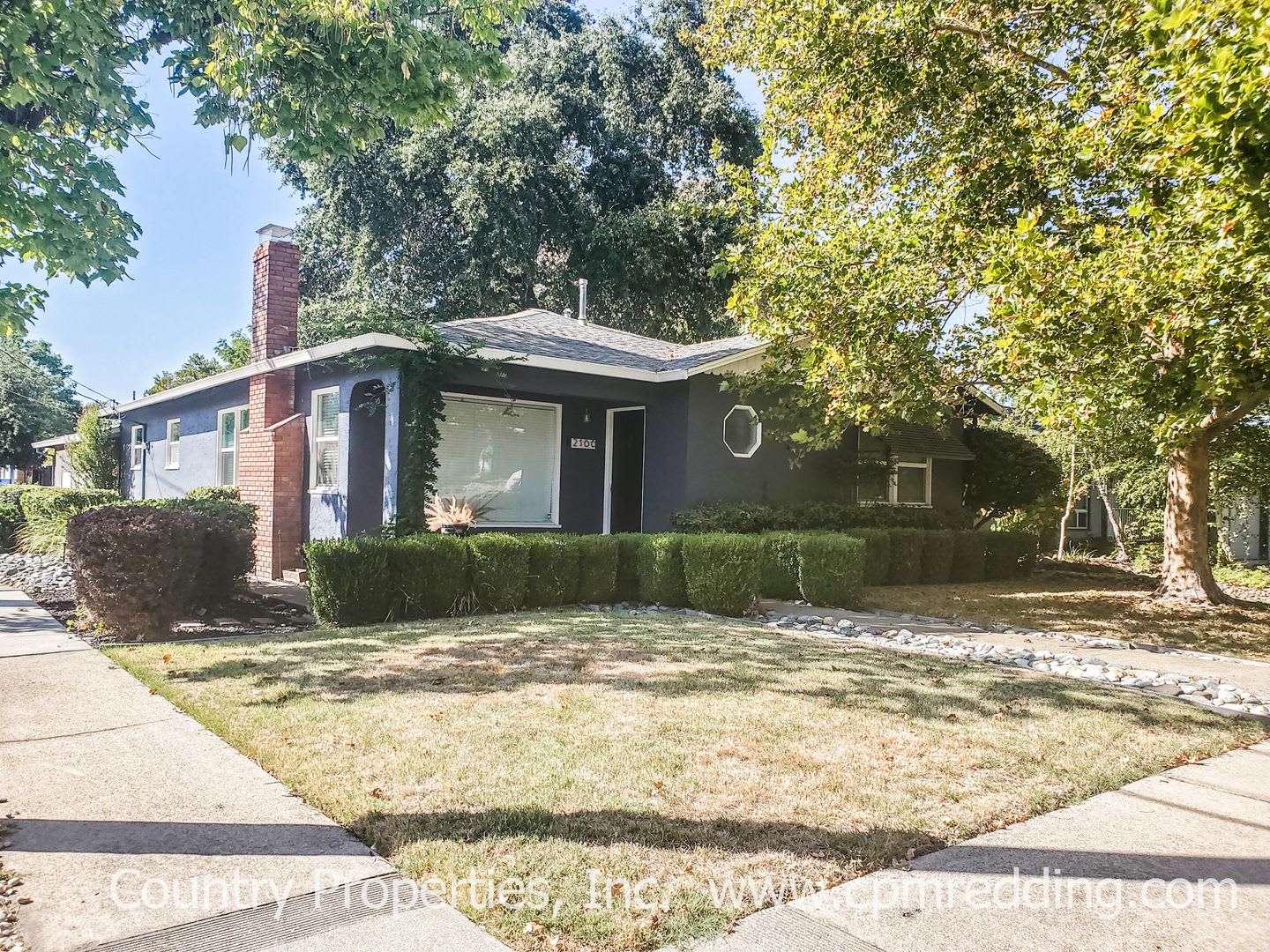 Updated Garden Tract Stunner with Landscaper Included! – photo 1