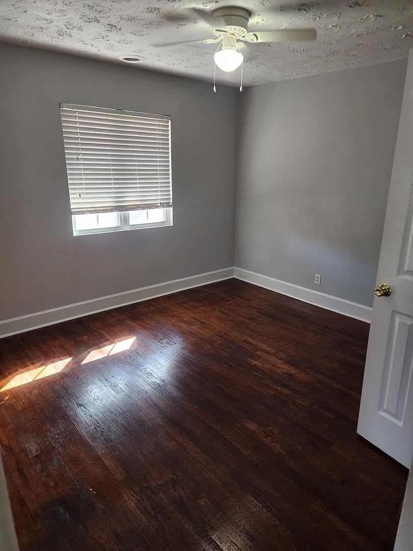Room in 2 Bedroom Home at 8th St – photo 1 of 12