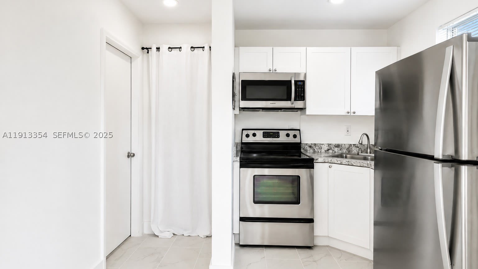 6950 NW 8th Ave – photo 1