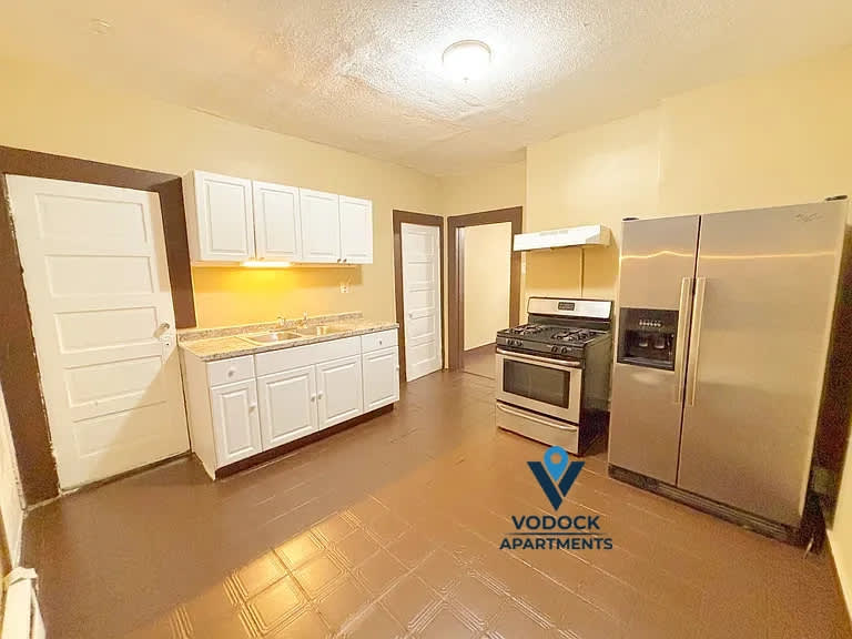 128 Madison St – photo 1