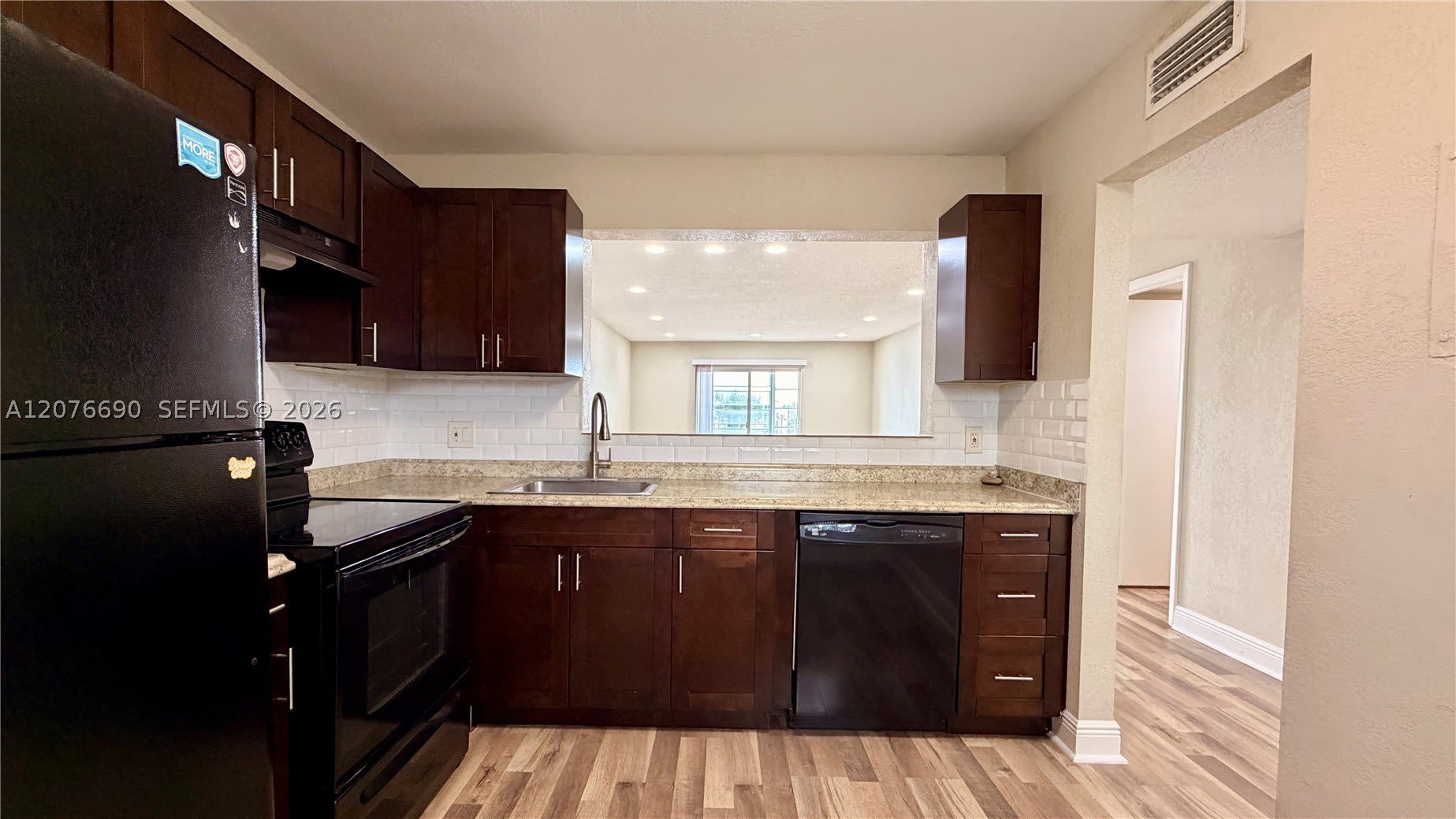 879 NE 195th St – photo 1 of 33