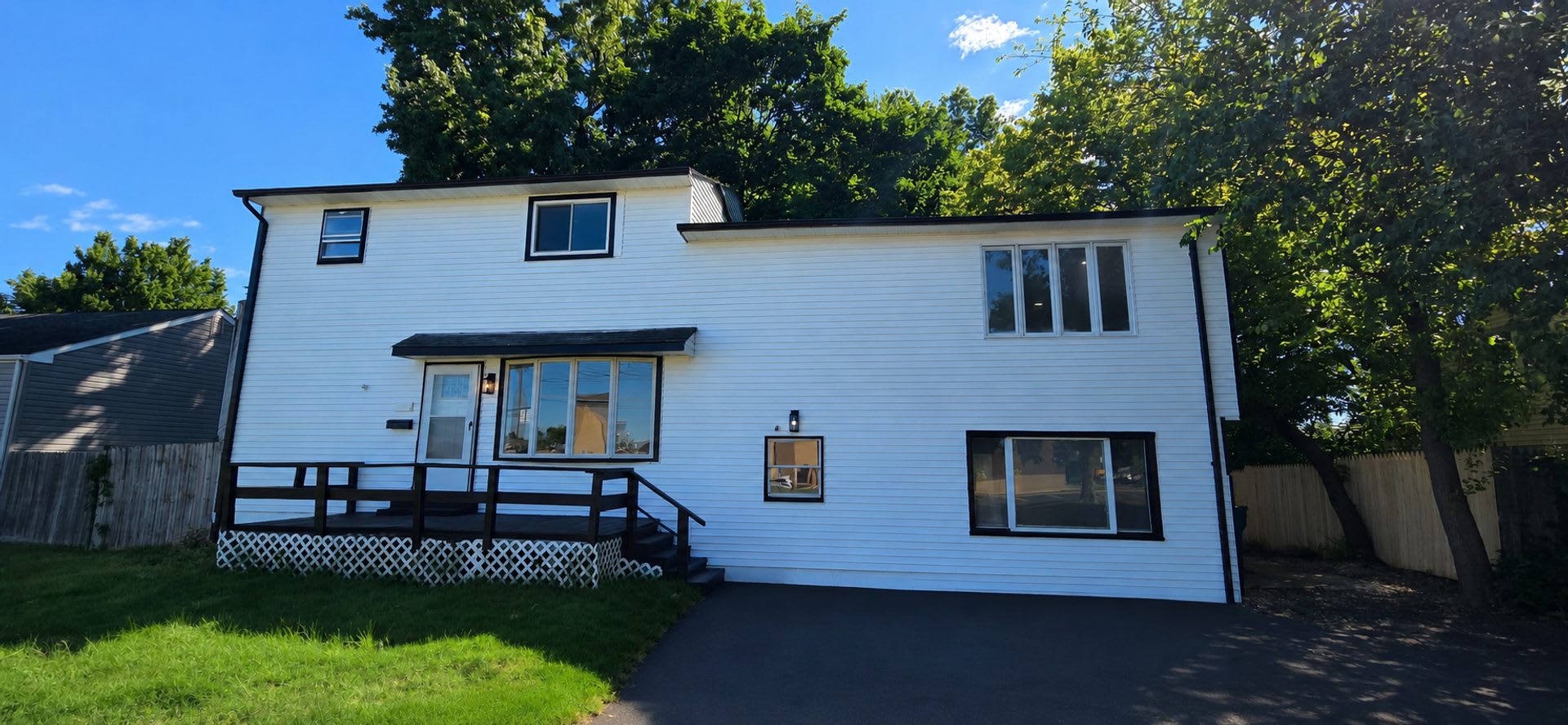 Freshly Updated 6-Bedroom Home with Yard & Driveway – photo 1