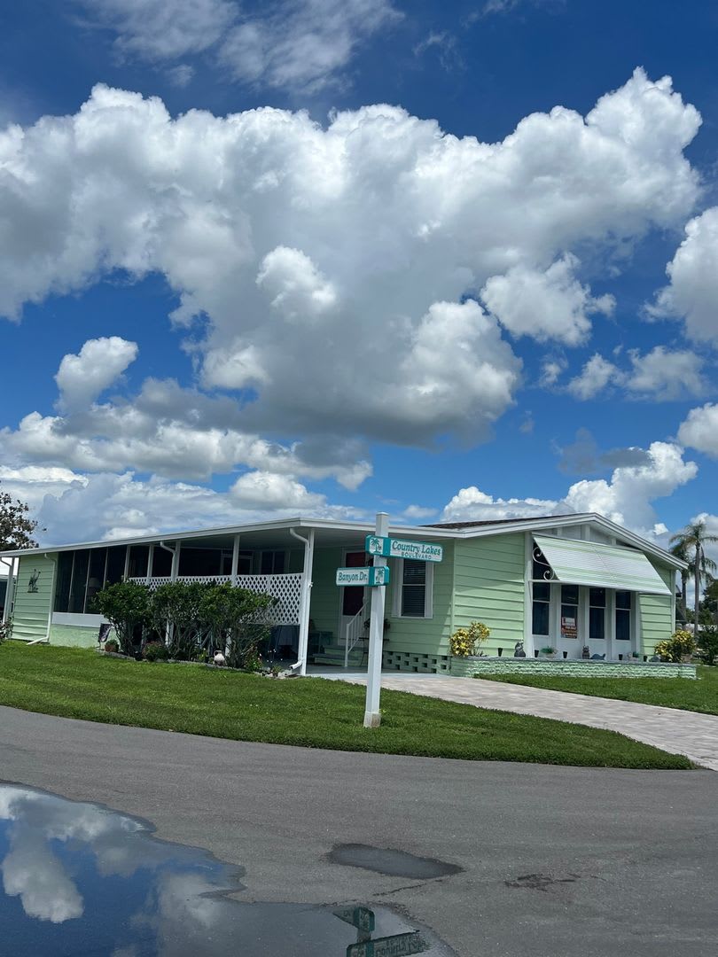 Updated Coastal 2BR/2BA Corner Lot Home in Gated 55+ Resort – photo 1