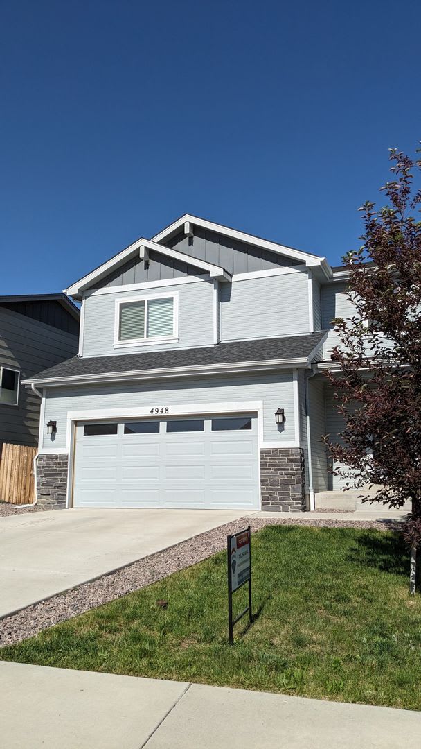 4 Bedrooms 3 5 Bathrooms 2 Car Garage Finished Walkout Basement Fenced Yard Pikes Peak Views – photo 1