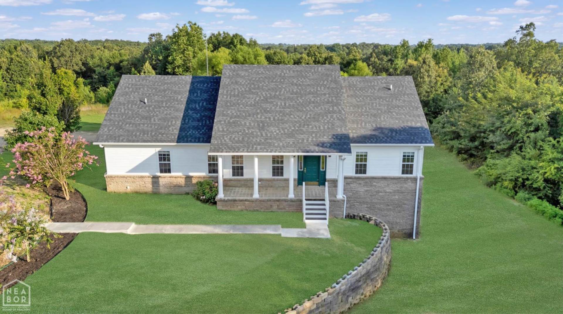 Spacious 5-Bedroom Home on 1.5+ Acres in West Side School District – photo 1 of 36