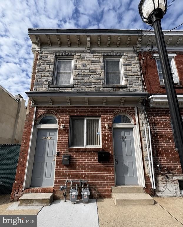 302 E 11TH STREET – photo 1 of 9