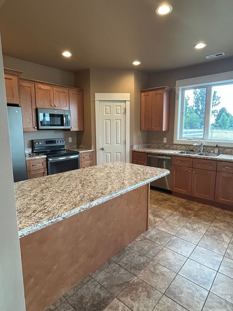 Rare Horse Property in Billings Heights – 4BD Home on 2 Irrigated Acres! – photo 1 of 22