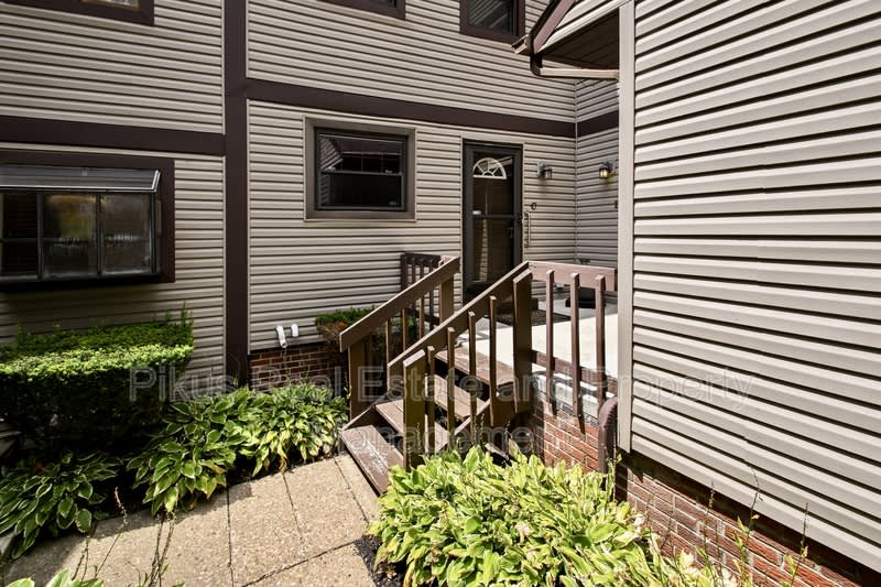 7819 Hills &amp; Dales Road NW – photo 1 of 18