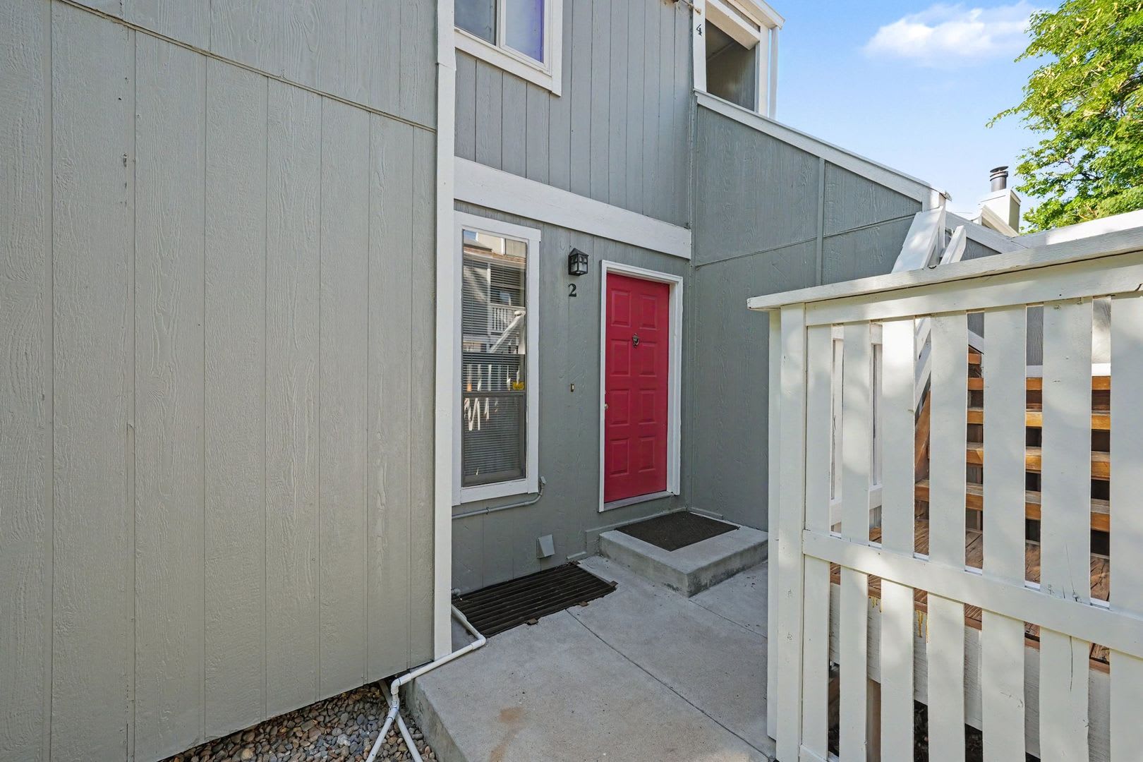 Spacious 2BR/2BA Corner Unit with Finished Basement, Private Patio & Garage – photo 1
