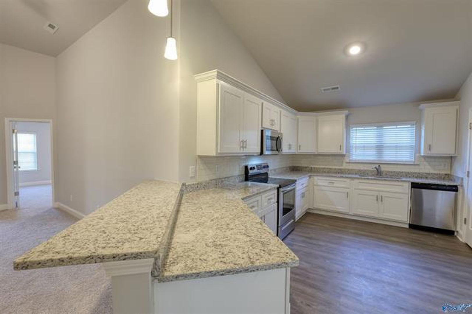 **PRICE DROP**Fall in love with this stunning 4-bedroom, 3-bathroom full-brick ranch home – photo 1