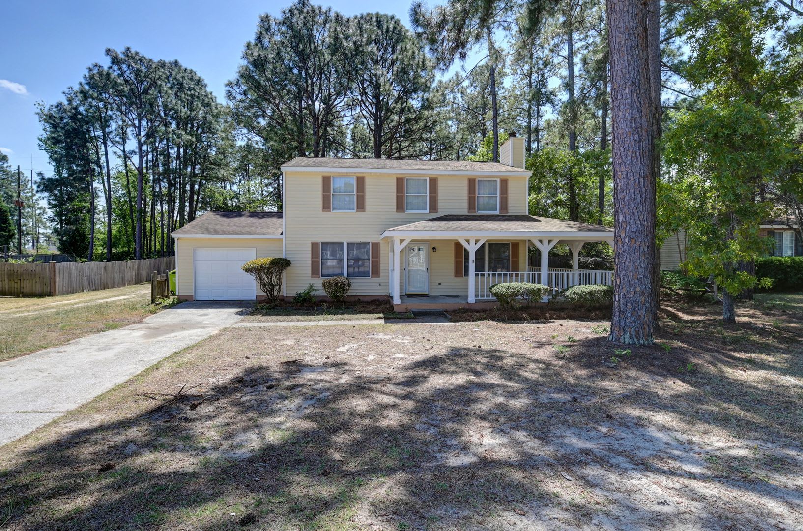 Spacious 3BR Home with Covered Front Porch & Expansive Backyard Near Dining & Shopping – photo 1