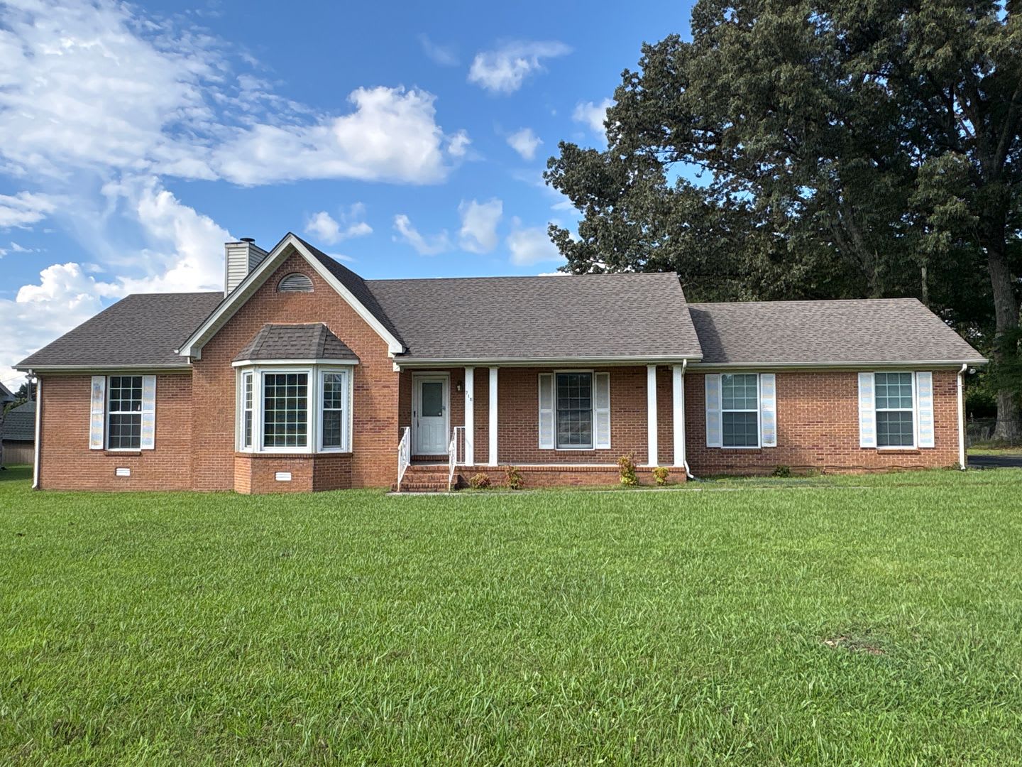Spacious Brick Home with Fenced-In Back Yard! – photo 1 of 28