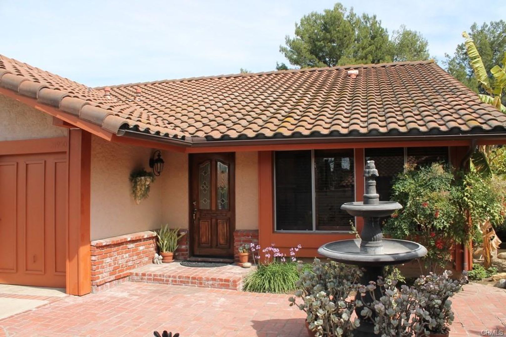 This incredible 4 bedroom single level home with private GATE entry – photo 1 of 11