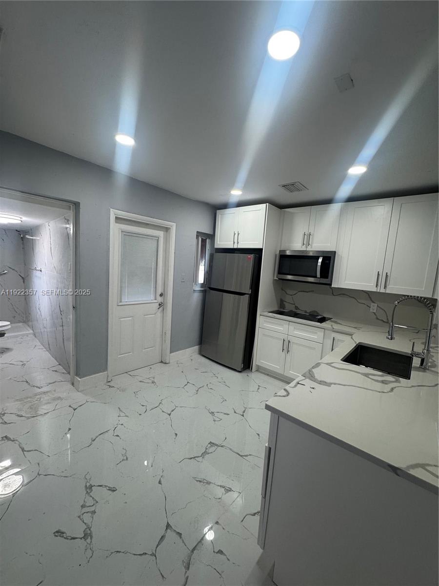 1171 Northeast 161st Terrace – photo 1