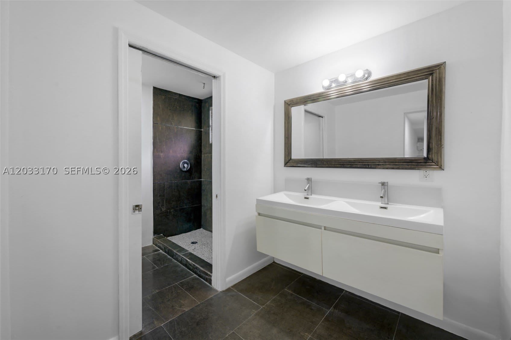 348 NE 58th St – photo 1