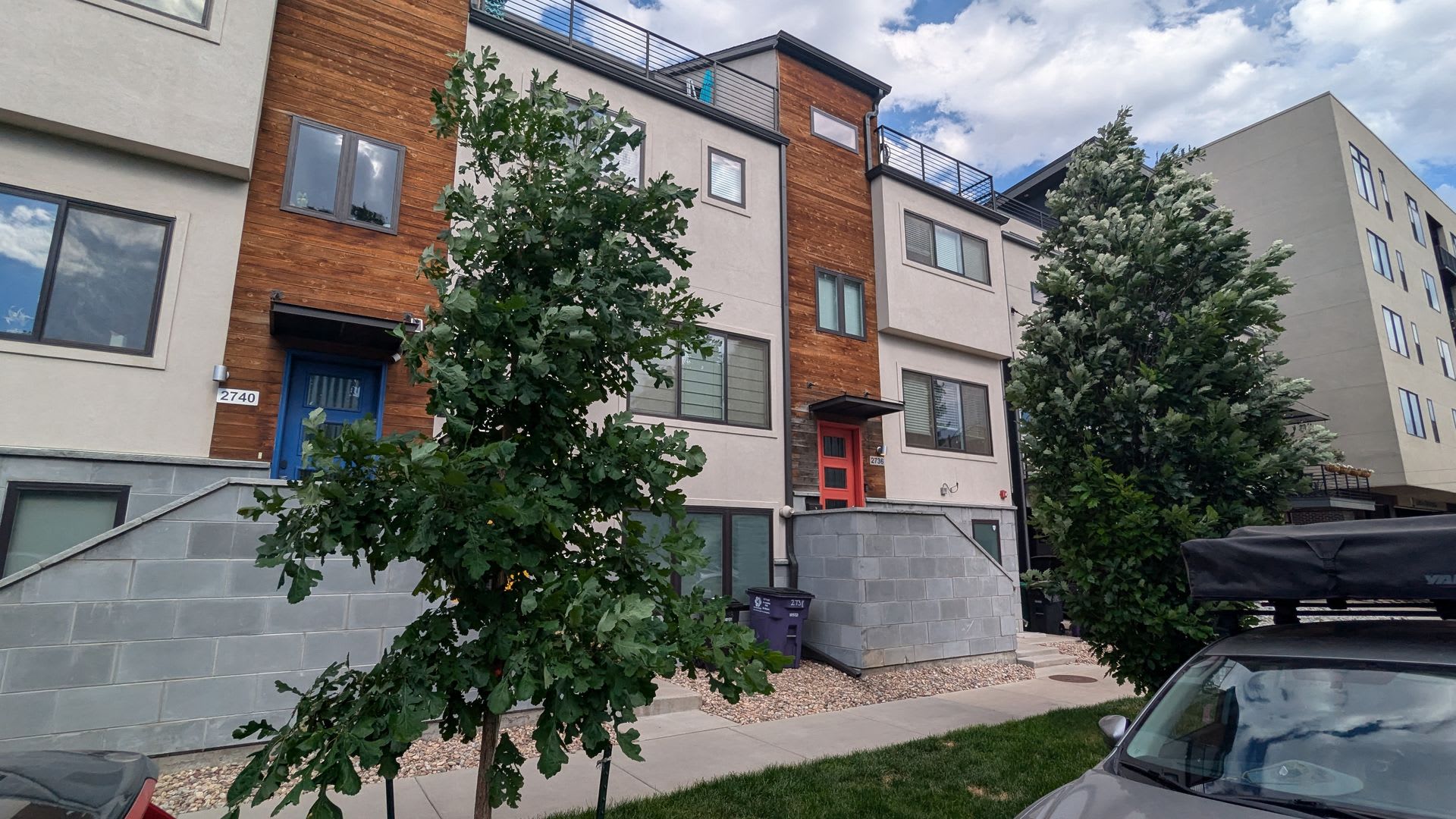 STUNNING 4-LEVEL TOWNHOME IN HIGHLANDS W/ 2-CAR GARAGE +AMAZING ROOFTOP DECK WITH VIEWS! – photo 1