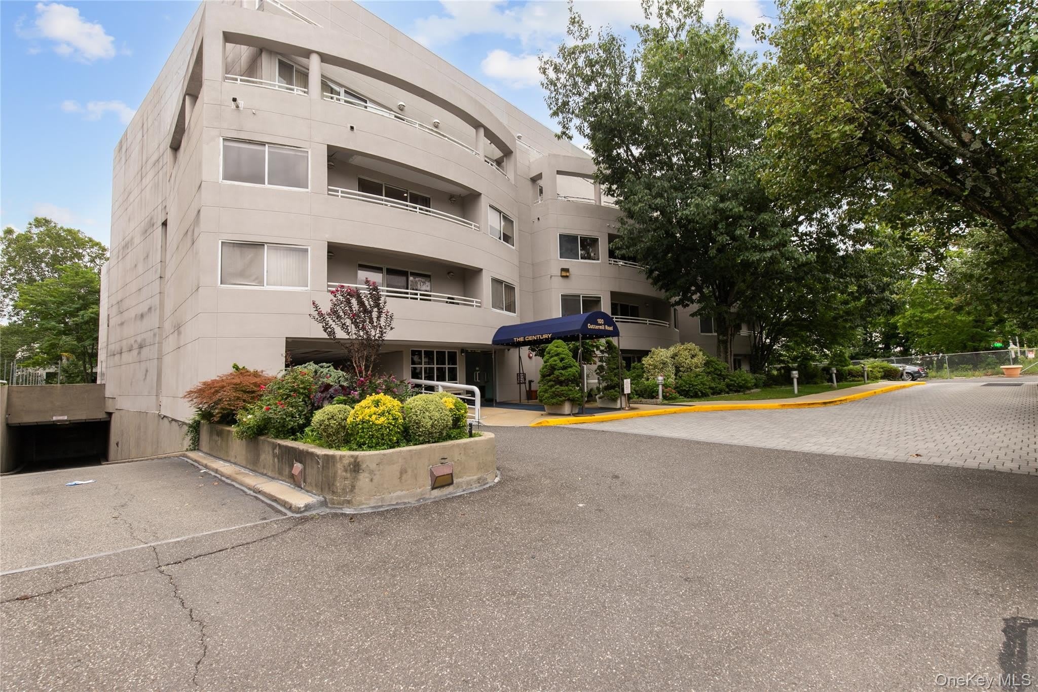 100 cuttermill Road – photo 1 of 28
